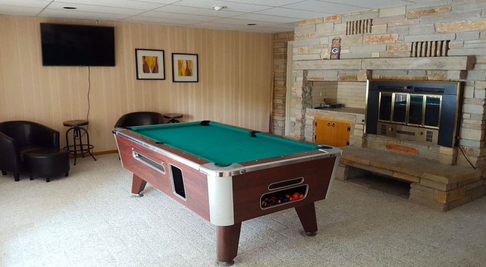 Play a few games of pool in the game room downstairs