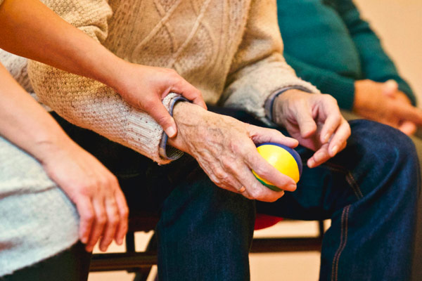 Activity volunteer with a senior. Activity volunteer with a senior.